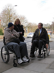 Martin Tod listens to Andy and Jane Cadle-Mills about what it's like to use a wheelchair in Winchester Learning about wheelchair access in Winchester